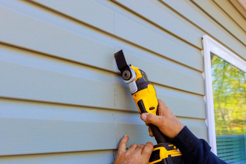 Installing New Vinyl Siding Panels